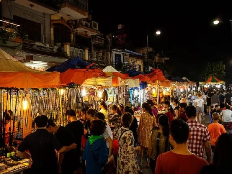 The scene of the bustling night market in Hoi An