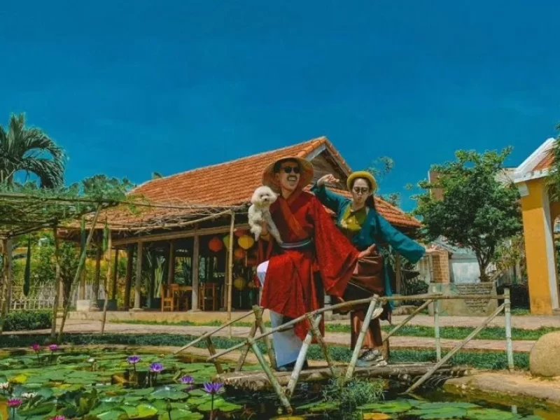 Performers in traditional costume at Hoi An Impression Theme Park