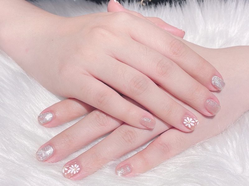 Top 5 Nail Salons in Hanoi Old Quarter Manicured nails with soft pink polish at a Hanoi nail salon