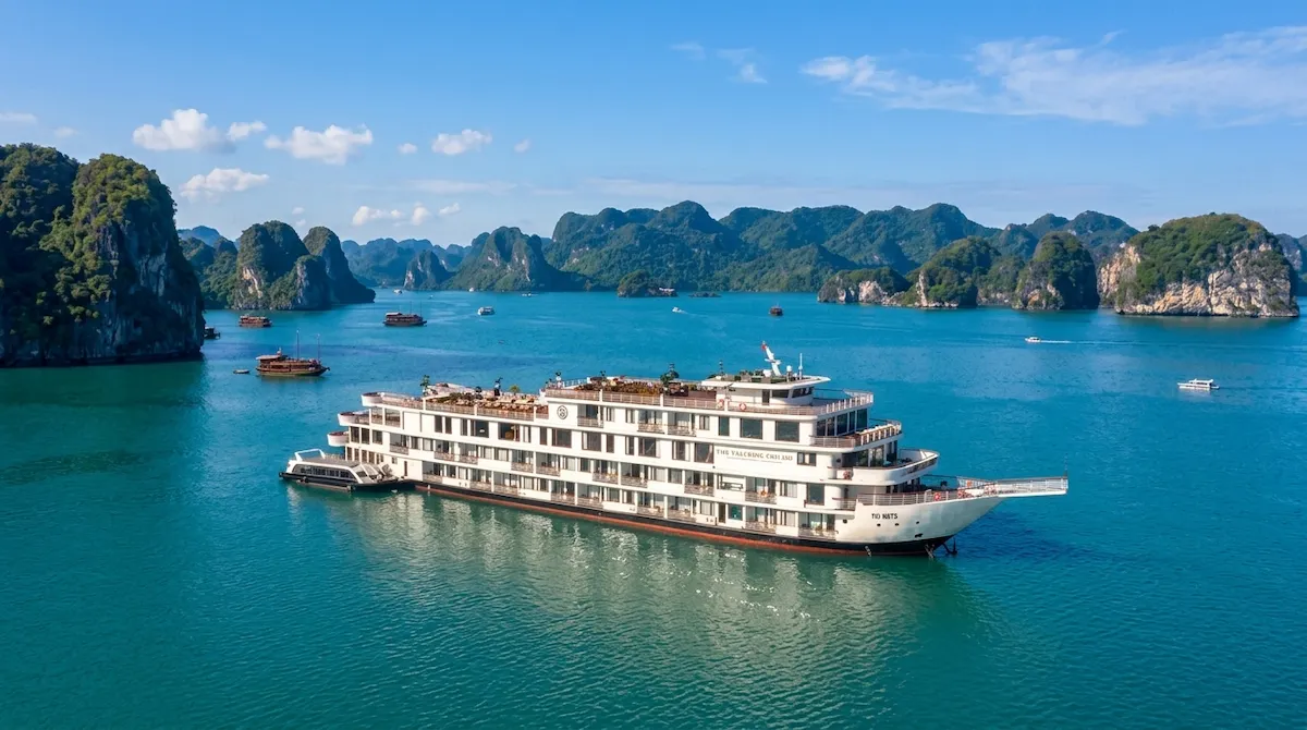 Ambassador Cruise: Luxury Experience on Halong Bay Waters - Ambassador Premium | Vietnam Discovery Tours Luxurious Ambassador Premium cabin with twin beds private balcony and panoramic ocean view of Halong Bay
