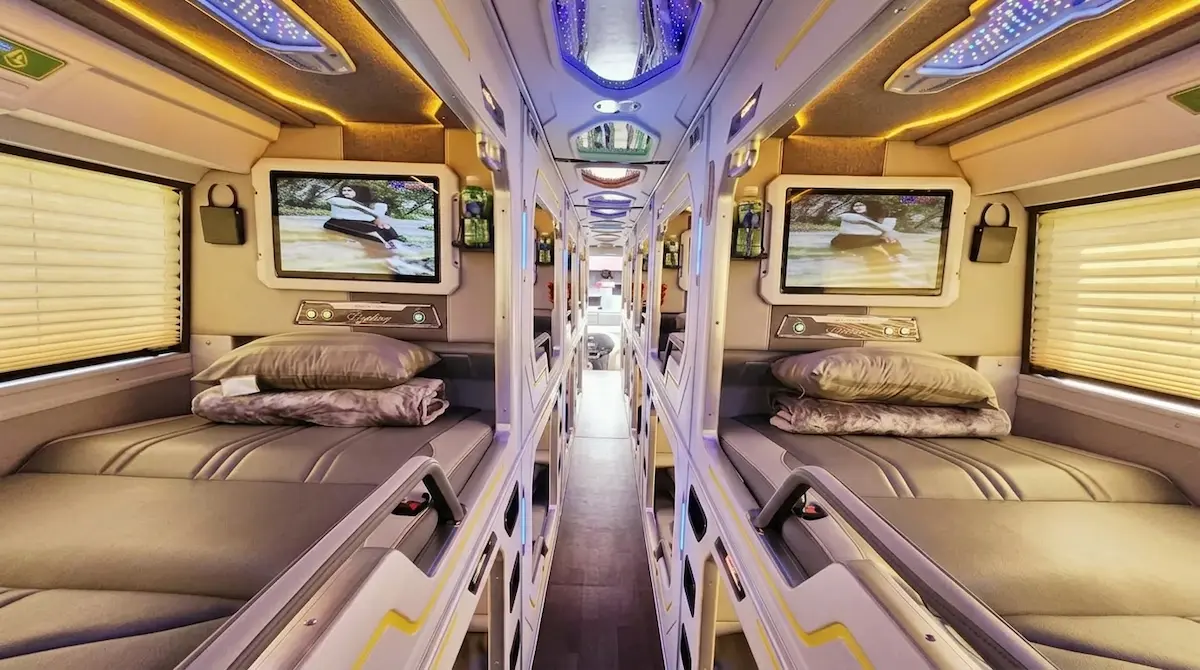 Sapa to Ha Long VIP Sleeper Bus Single Cabin | Vietnam Discovery Tours Modern upper single cabin interior on HK Open Tour VIP sleeper bus