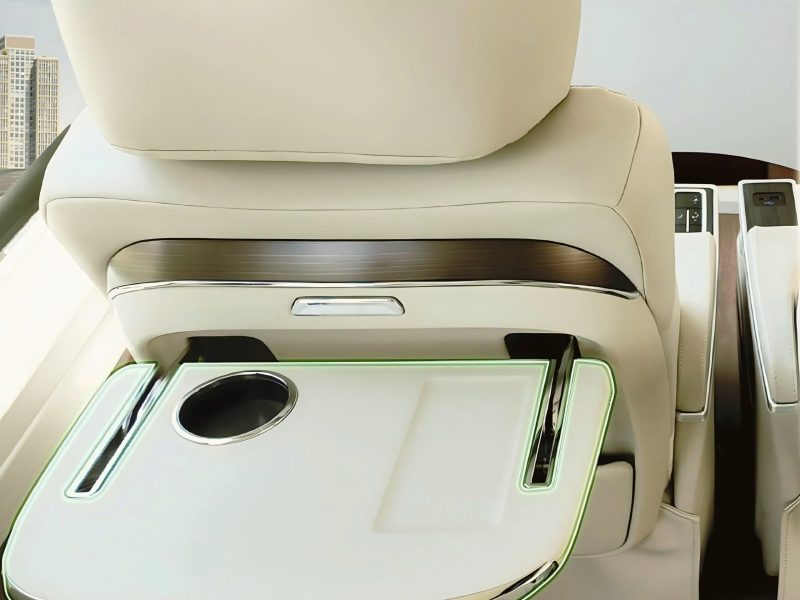 Foldable tray table and cup holder on the VIP limousine seat