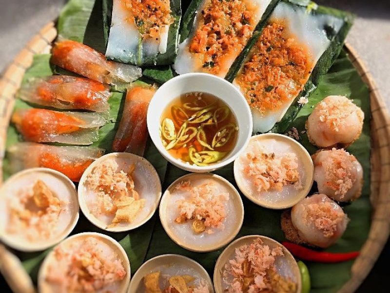 Platter of Hue specialties including banh beo, banh nam and dipping sauce